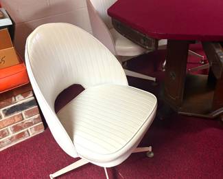 Set of 4 MCM vinyl swivel chairs 