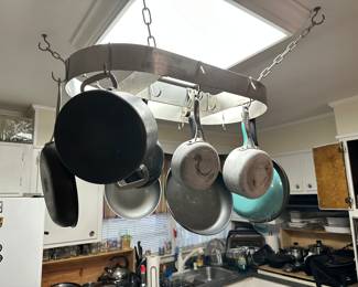 Hanging pot rack, pots and pans.
