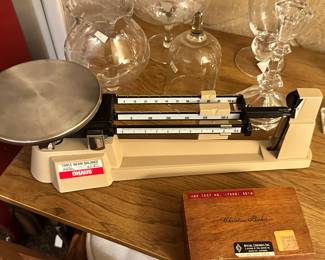 Has triple beam scale with weights. Other scales available as well