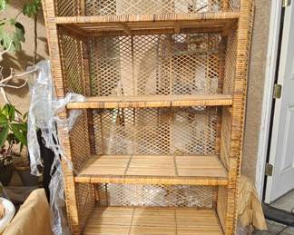 Vintage wicker shelving unit.