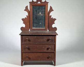MINIATURE CHEST with MIRROR | Miniature three drawer chest, each full-width drawer with double pulls, with mirror on carved brackets. - h. 19.5 x w. 5.25 x l. 11 in