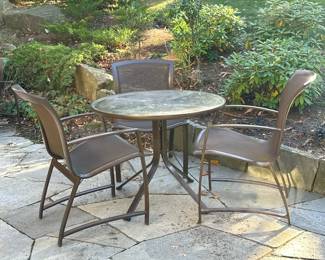 (4pc) Brown Jordan Table & Chairs | Outdoor dining suite comprising a round table and three armchairs (each h. 35.5 x 23.25 x 24 in.) - h. 28 x dia. 35.5 in (table)