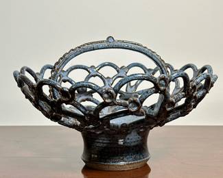 HERZOG GLAZED POTTERY OPENWORK BASKET | Blue and brown flambé glaze, signed on the bottom. - h. 6 x dia. 10 in