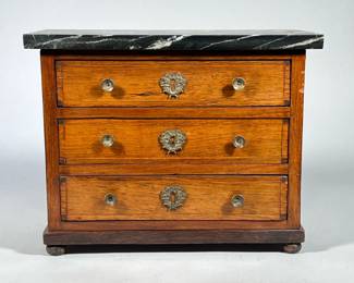 MINIATURE CHEST with MARBLE TOP | Chest with three inlaid drawers on bun feet, having brass pulls & escutcheons, with attached black marble top. - h. 10.5 x w. 6.5 x l. 13.5 in