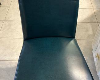 Pair of greenish-blue chairs