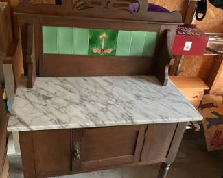 #183 Washstand w/Marble Top and Tile Back w/1 door - 33x17x48 on Wheels - w/handing towel holder $125.00