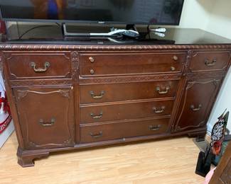 #209 Wood Antique Buffet w/7 drawers (one drawer silverware divider) w/glass protect top and 2 doors w/shelf inside - 60x20x36 (as is finish and door hinge) $75.00