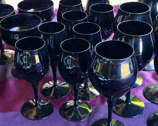 Amethyst crystal set including wine glasses, matching water glasses and more. 