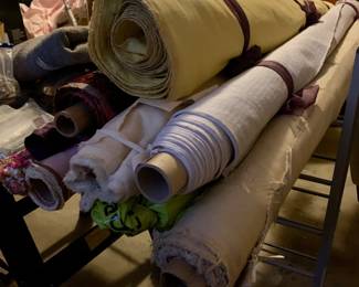 Bolts of upholstery fabric, we also have some smaller assorted fabrics