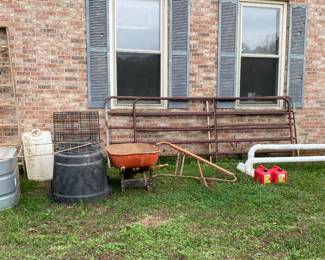 Wooden ladder, horse troughs, livestock gates, vintage push plow, spreader, wheelbarrow