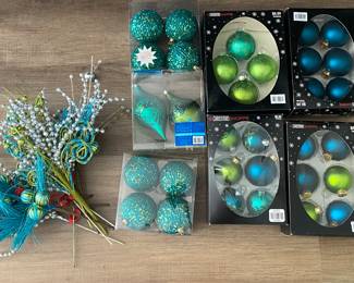 Aqua blue and lime green ornaments and stems. There are more than pictured. Will be sold all together as a lot.