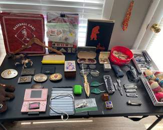 Nintendo DS with 2 games, iPad, AirPods, various knives, vintage pound puppy, etc.