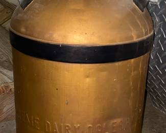 Antique brass milk can