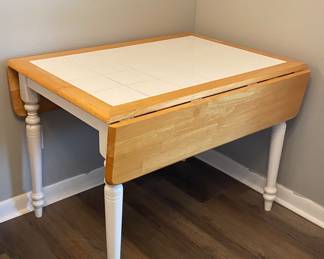 Tile top drop leaf table