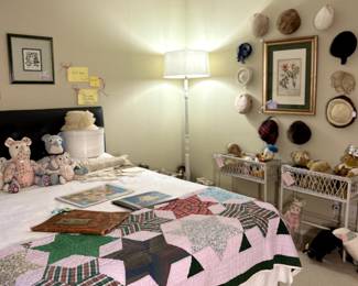 vintage hat collection and star pattern handmade quilt