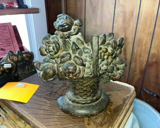 Cast iron basket of flowers door stop