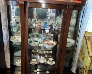 Wide antique curved glass china cabinet