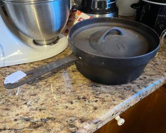 Cast iron w/ lid marked 11