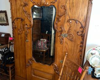 Elaborate antique armoire