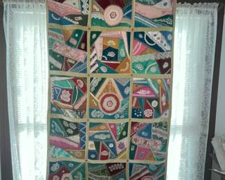 Wonderful "Crazy Quilt" hanging over the settee