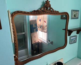 Gorgeous vintage mirror in the bathroom