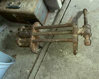 Antique iron under bench vise