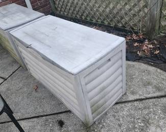 Two large Suncast outdoor storage units 