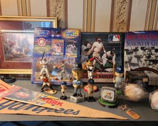 Yankees pennant, baseball collectibles. signed baseballs