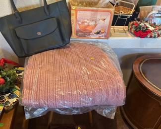 Purse $2
Bowling Ball with shoes $5
Blanket $1
Small Table 