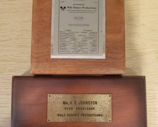 Awards for Oliver B. Johnston, Vice President of Marketing for Walt Disney Productions