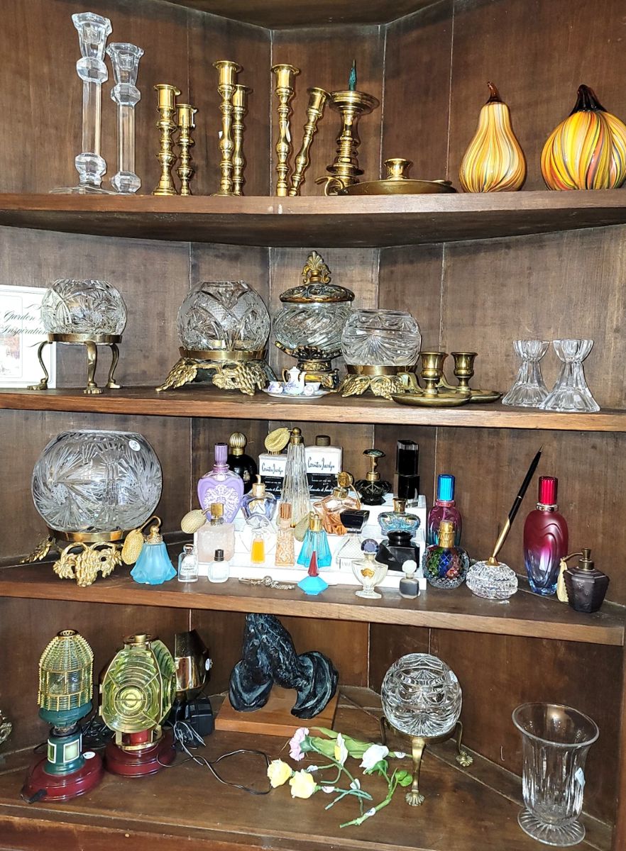 Candle holders, rose bowls and antique perfume bottles