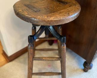 Antique oak and iron drafting swivel stool