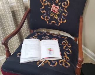 This chair is gorgeous!  The black background for the needlepoint is stunning!