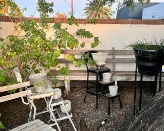 Vintage Garden folding chairs and great garden bench in the background 