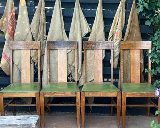I can’t say enough about these darling dining room chairs with green leather seats