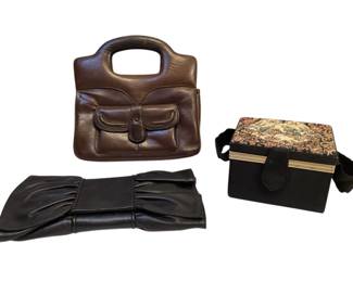 ROHU537 Three Small Vintage Bags Ann Taylor And Rolego Soft black leather Ann Taylor clutch; vintage gros grain box bag with tapestry top and mirrored inside lid; vintage Rolego mini accordion multi compartment brown leather purse from Italy.
