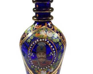 ROHU517 Antique Persian Glass Hookah Base Qajar Dynasty Nasser Al Din Shah Handpainted cobalt blue with portrait of Nasser Al Din Shah from the Qajar Dynasty (1831-1896). 10.5" tall x 5.5"
