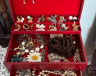 Costume jewelry in a vintage jewelry box