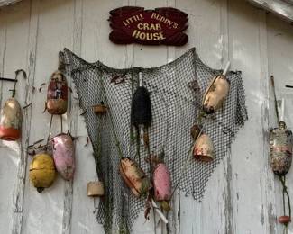 Buoys, net, hand carved sign.