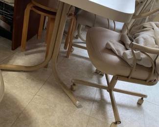 Tubular and rolling kitchen table set of 4 rolling chairs 