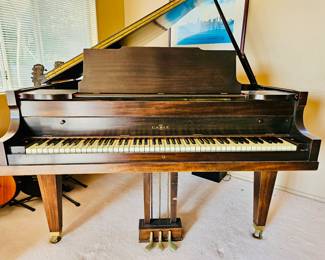 Baby grand piano by Cable 