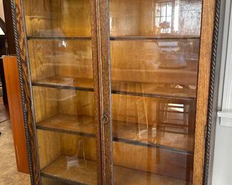 Quarter Sawn Tiger Oak display cabinet with antique glass. 