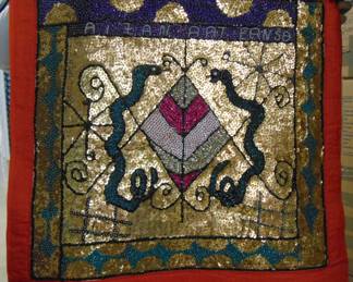 VF 15 Hattian Vodou Flag, beaded textile, approx. 36x36."
