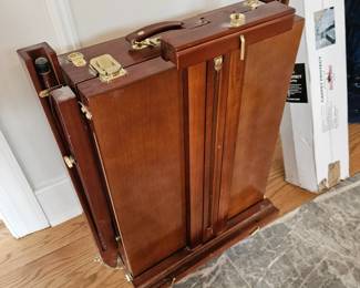 Folding artists stand with storage box.