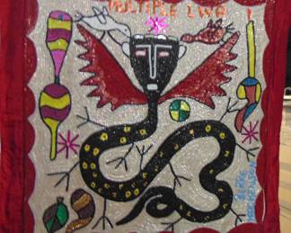 VF 20 Hattian Vodou Flag, by artist Berre MacKenson, beaded textile, approx. 36x36."