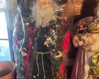There are a ton of great vintage Holiday decorations including these two 4 ft. Santa's