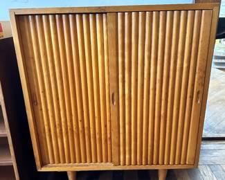 MCM sliding door cabinet (note the beautiful floors)