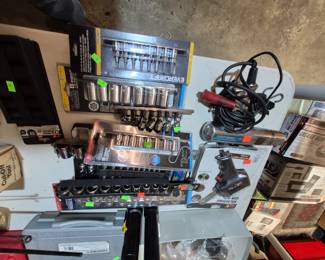 Lots of new and slightly used mechanic tools