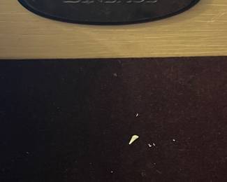 Lineage branding on China cabinet