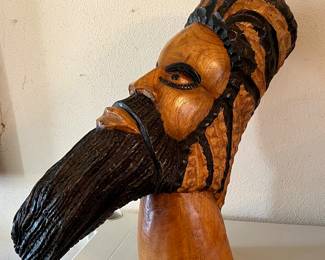 Hand carved wooden Jamaican
Statue